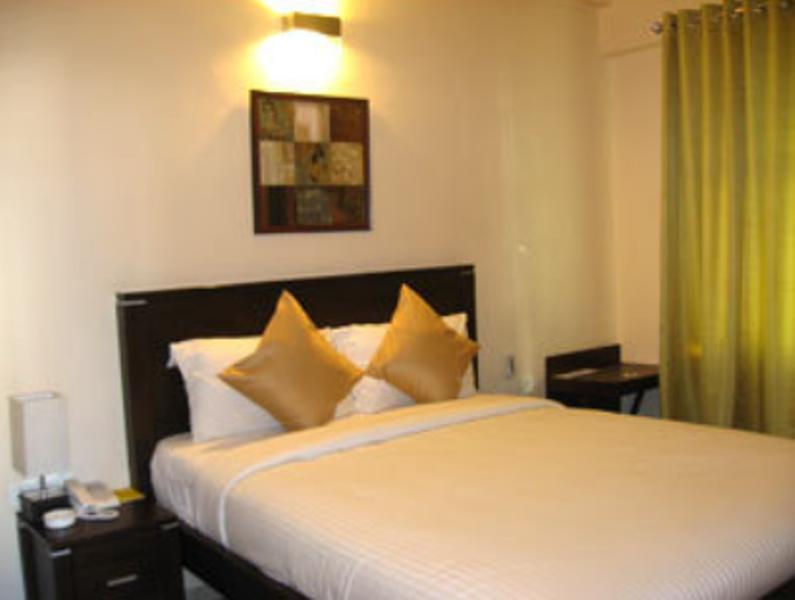 Hotel The Elite Suites Pune Oda fotoğraf