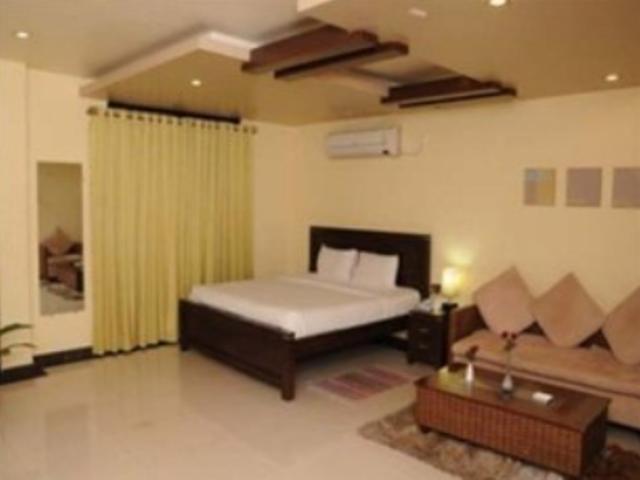 Hotel The Elite Suites Pune Oda fotoğraf