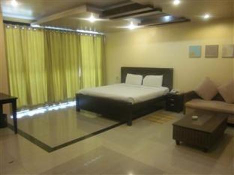Hotel The Elite Suites Pune Oda fotoğraf